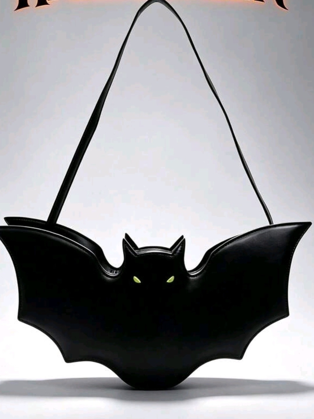 Black Bat-Shaped Shoulder Bag with Neon Green Eyes